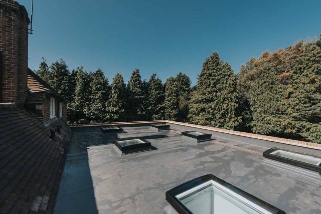 Newly constructed slate roof featuring custom leadwork on a new build property in Richmond.