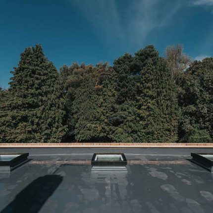 Portfolio showcase of a modern Richmond flat roof installation, delivered by our expert london roofing contractors with enhanced load-bearing capacity.