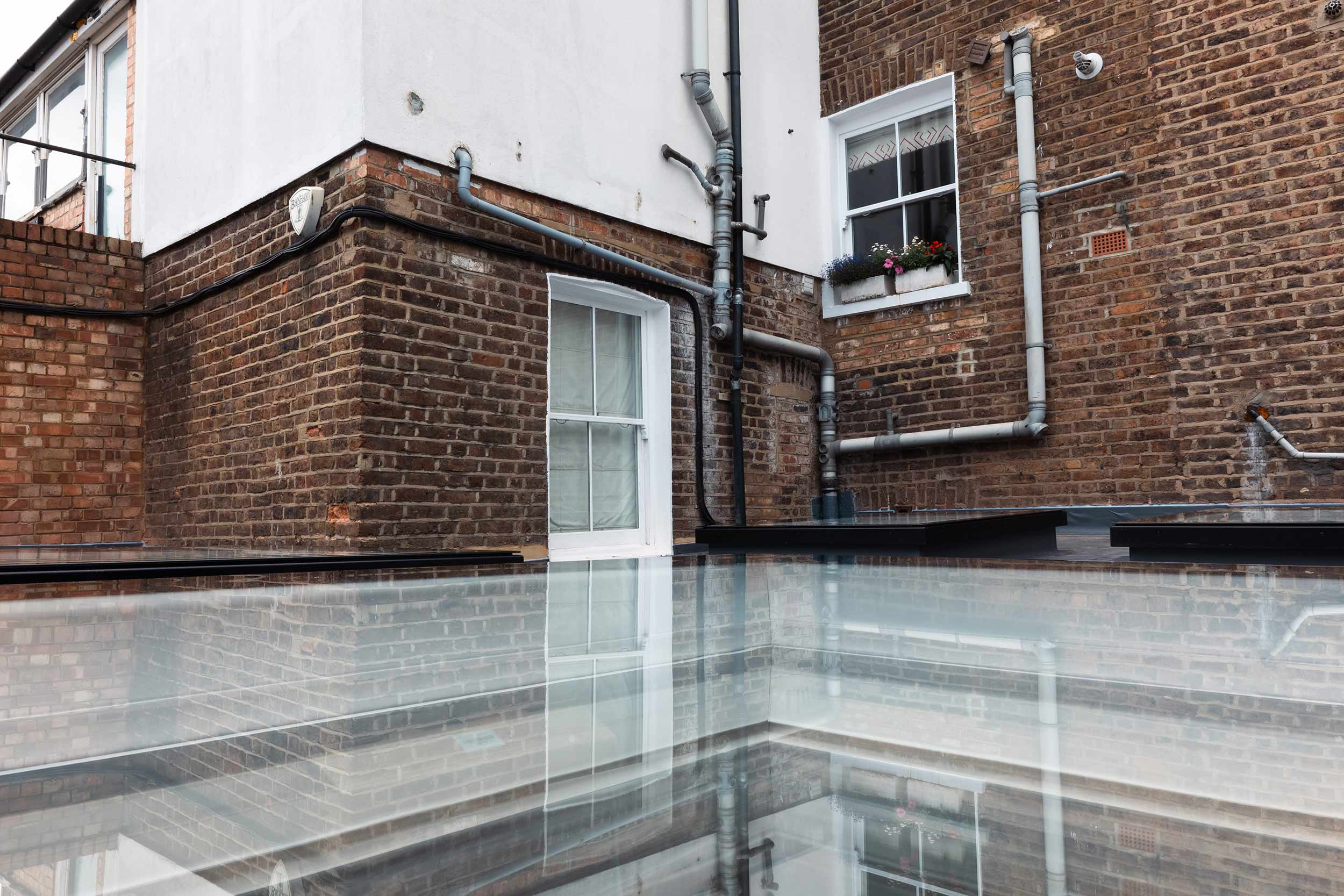 Roofer Notting Hill Electric Velux Skylights Polycarbonate London Contractors Refurbishment Building Regulation Roofers