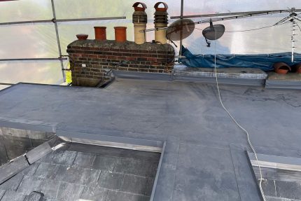 High-performance Sika Sarnafil flat roofing system installed on a dormer window in North London.