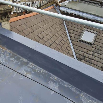 Robust parapet wall and flat roof membrane construction completed in Putney by our highly skilled flat roofer london team.