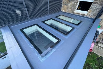 Completed leak-free flat roof upgrade enhancing the appearance and value of a home in Queen's Park.