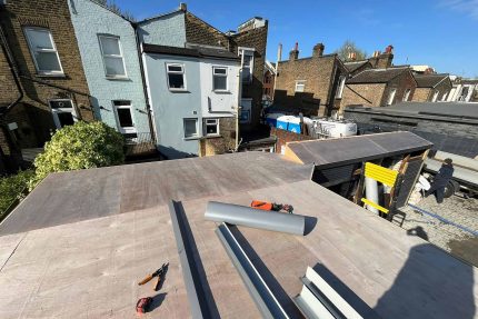 Seamless single-ply flat roofing installation providing long-lasting protection against the elements.