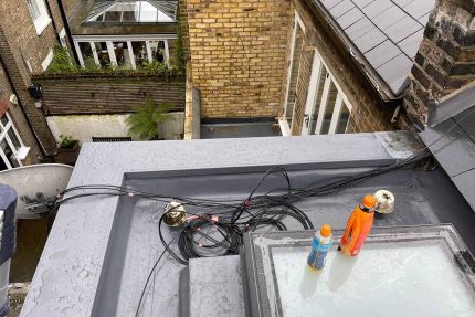 Bespoke Roman bath style outdoor terrace and flat roof installation completed in Belgravia, London.