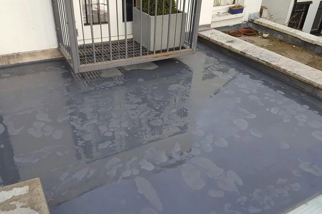 Highgate roofer near me in North London Single Ply Flat Roof New coping stones with damp proofing, we want happy customers.