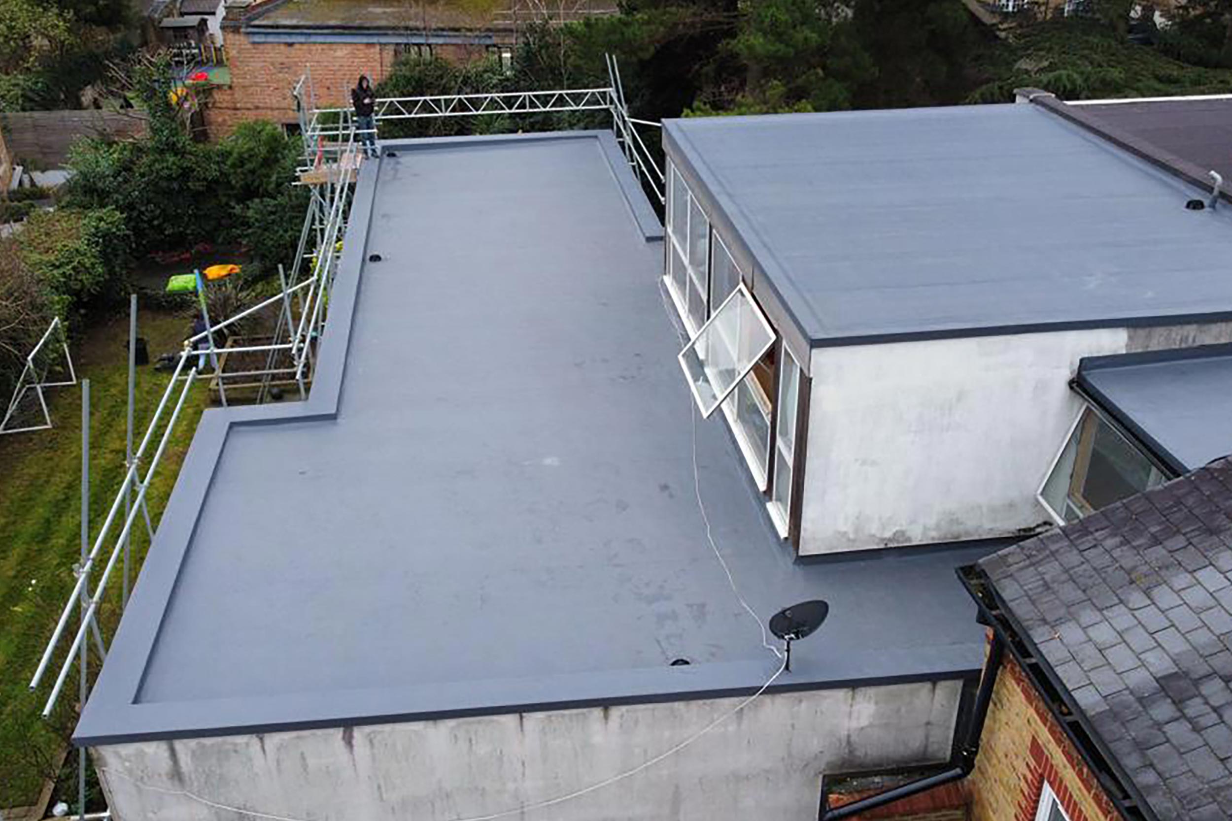 flat-roofer-commercial-building-chiswick-iko-armourplan-contractors-system-refurbishment-roofing-terrace-building-regulation