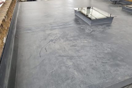 Close-up of a high-quality, weather-resistant flat roof installation completed to manufacturer specifications in London.