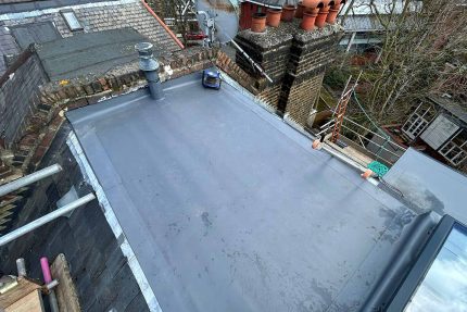 Brett Martin skylight incorporated into a modern flat roof replacement to provide natural interior lighting.