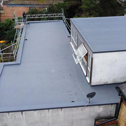 flat-roofer-commercial-building-chiswick-iko-armourplan-contractors-system-refurbishment-roofing-terrace-building-regulation