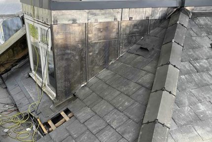 Installation of a vapour control barrier and insulation layer to ensure energy efficiency and building regulation compliance.