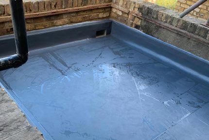 Seamless flat roof installation providing long-lasting protection for a property in Hammersmith.