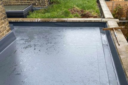 Sleek and modern flat roof covering installed to provide superior protection against water ingress.