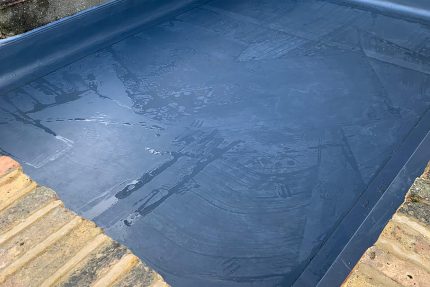 Professional flat roof replacement using durable, weather-resistant materials to prevent water infiltration.