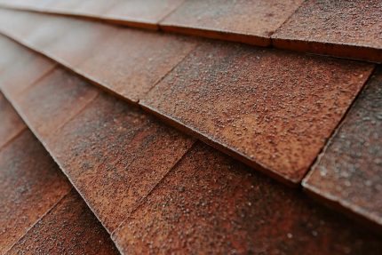 New build clay tile roof Surrey, roofing company ensures both aesthetic appeal and long-term performance, roof contractors and builders.