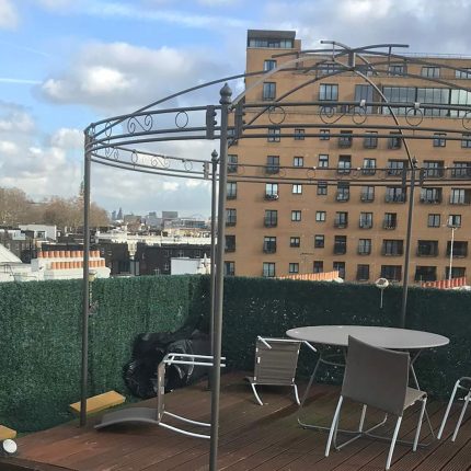 Beautifully finished rooftop terrace in Central London showcasing premium decking over a secure waterproof membrane installed by our expert london roofing team.