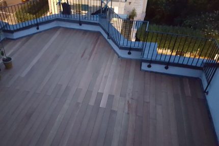 Flat roofing refurbishment services using Sika Sarnafil, roof terrace wood decking Kensington London a specialist roof building company.
