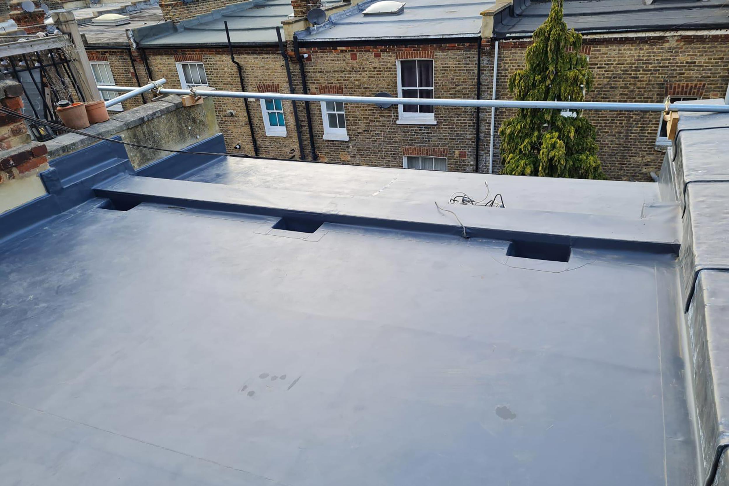 Roofing company services Knightsbridge London, flat felt roof terrace refurbishments builders, contractors project quality and reliability.