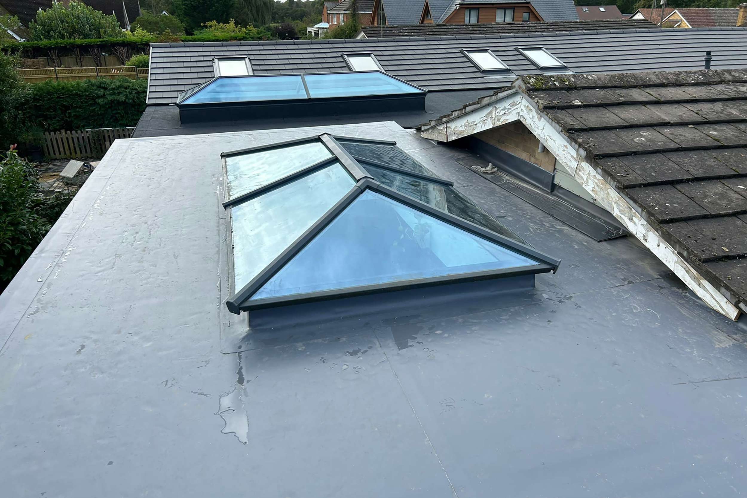 Single Ply IKO Polymeric Flat Roof Richmond Surrey Greater London Roofer near me London Refurbishment Building Regulation