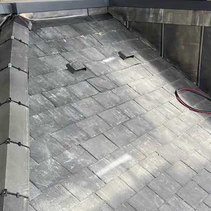 SikaPlan SGK single-ply flat roof system incorporating a high-performance vapour control barrier installed by a dedicated flat roofer in West Hampstead.