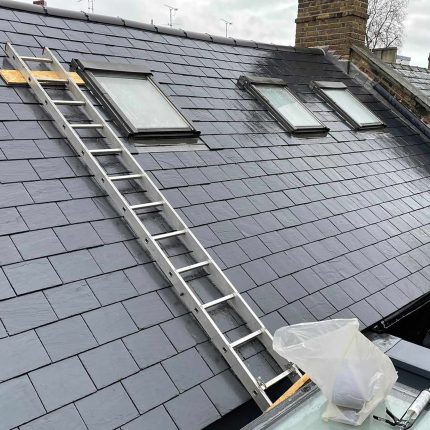 Commercial slate roof maintenance and structural skylight sealant application ensuring superior weatherproofing, carried out by our leading london roofing specialists.