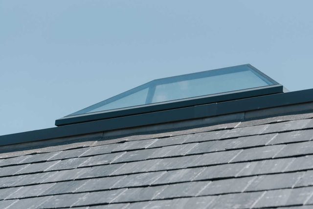 Roofer in Surrey flat and pitched roof builders contractors, new slate roof with lead work hips, roofing services companies near me.