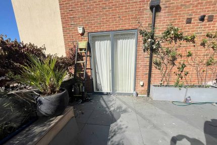 Expert Clapham roofers installing a durable Sika Sarnafil single-ply flat roof system.