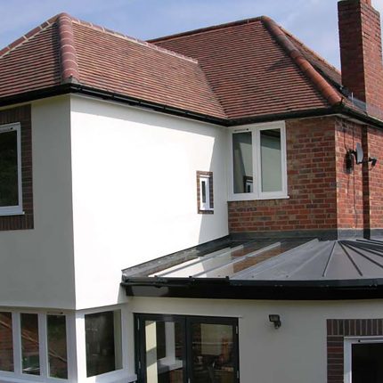 Standing seam zinc roof, handmade clay tiles, and slate restoration completed by our Hampstead roofers.