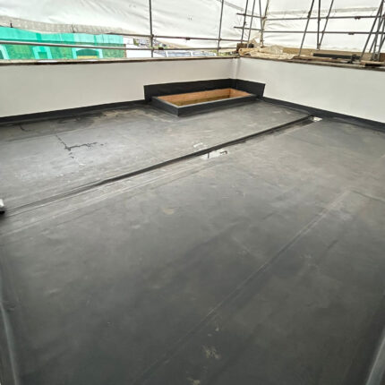Heavy-duty EPDM flat roof membrane ensuring long-term domestic leak prevention, fitted by our expert flat roofer London professionals.