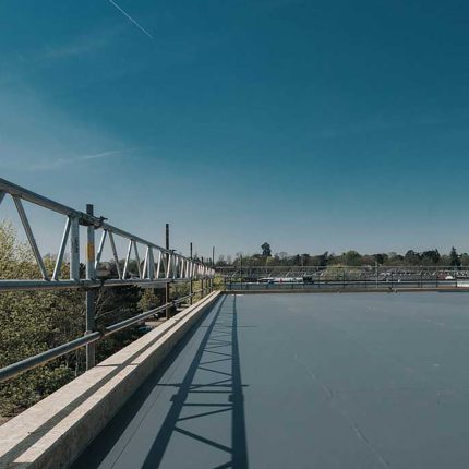 Expert Windsor roofers applying a durable Sika Sarnafil single-ply membrane.