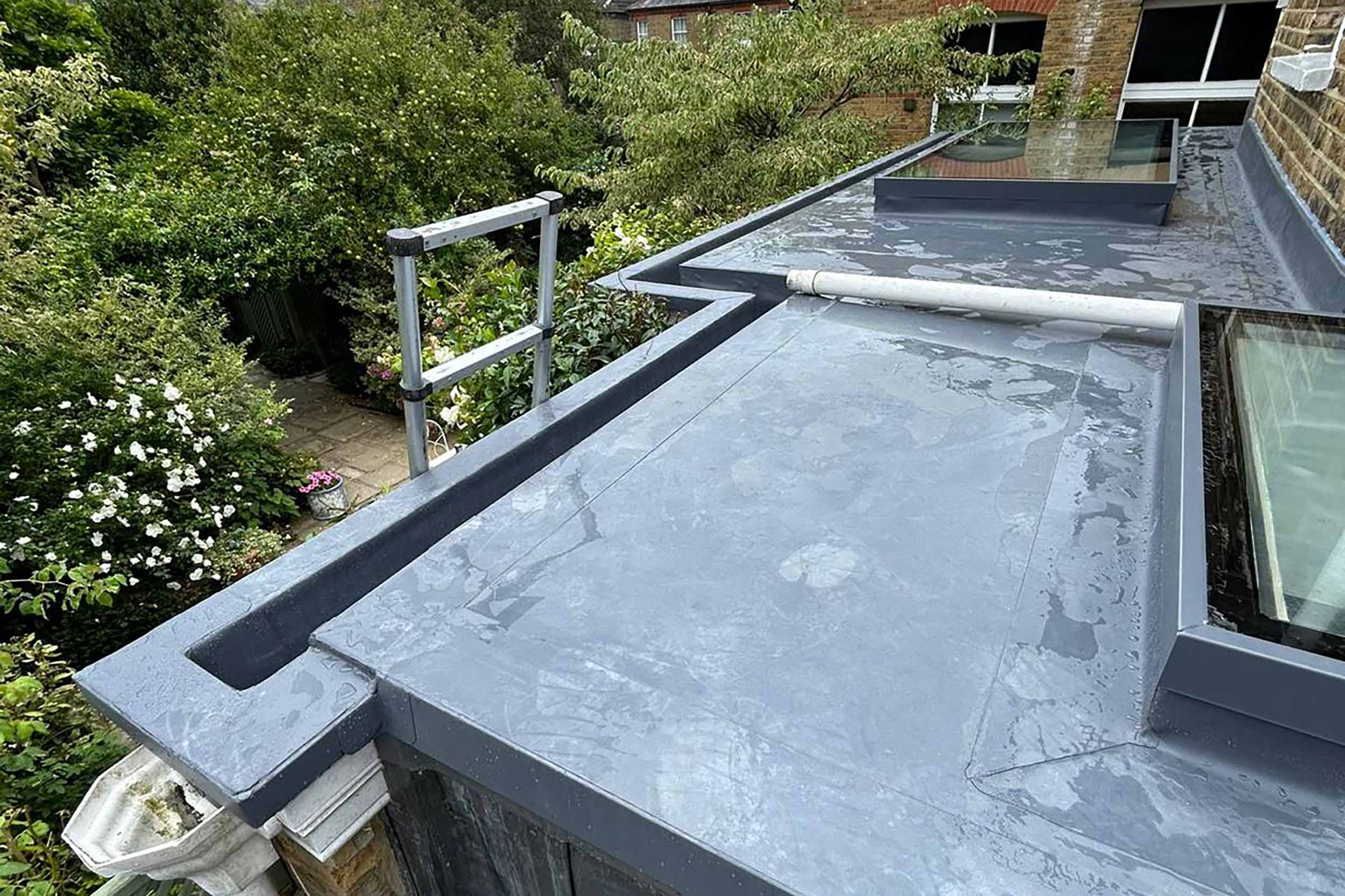 Flat Roofer Richmond Upon Thames IKO Single Ply System Best Roofer London Specialist Company Established Roofing Builders Sly Lights Installation