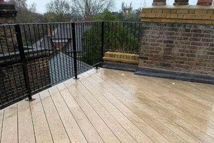 Expert Knightsbridge roofers applying a durable, high-performance single-ply flat roof membrane.