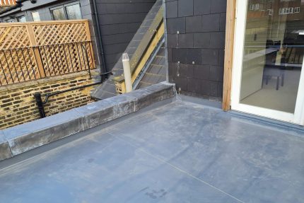 View project details for the Chelsea flat roof installation showing internal rainwater drainage.