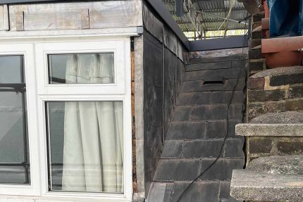 Expert Highgate roofers installing a durable, high-performance single-ply flat roof system.
