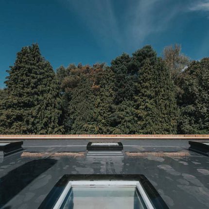 Single-ply membranes, warm deck insulation, and roof terraces installed by our Oxshott flat roofer.