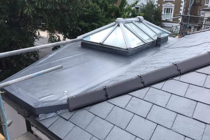 Finished Sika Sarnafil single-ply flat roof installation on a home in South West London.