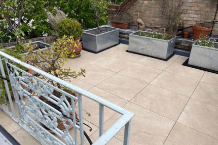 Expert Highbury roofers installing a durable, high-performance single-ply flat roof system.