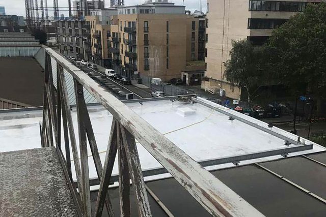 Professional flat roof replacement and repair services underway on a residential property in Highgate.