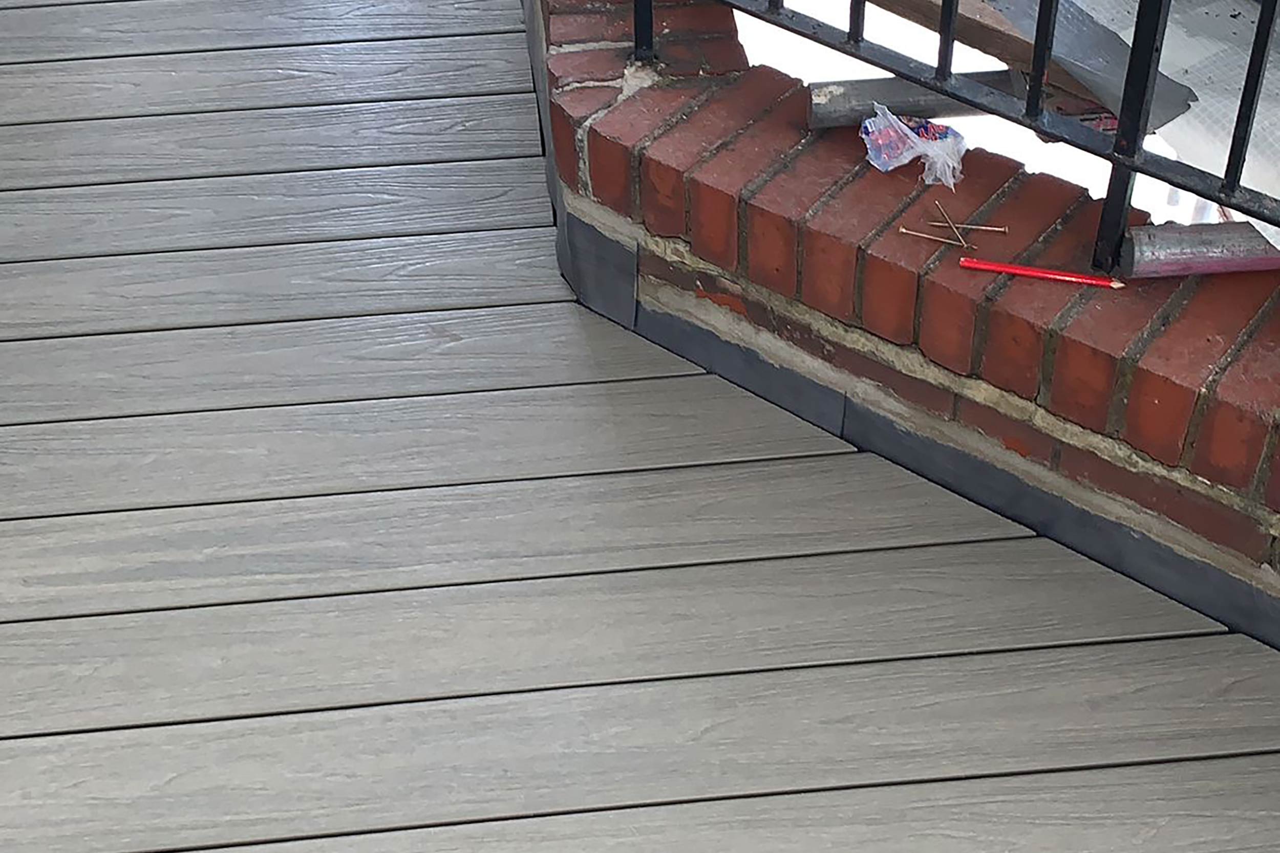 Roofer West Hampstead London flat felt roof repairs builder designer composite decking contractor building regulations terrace company