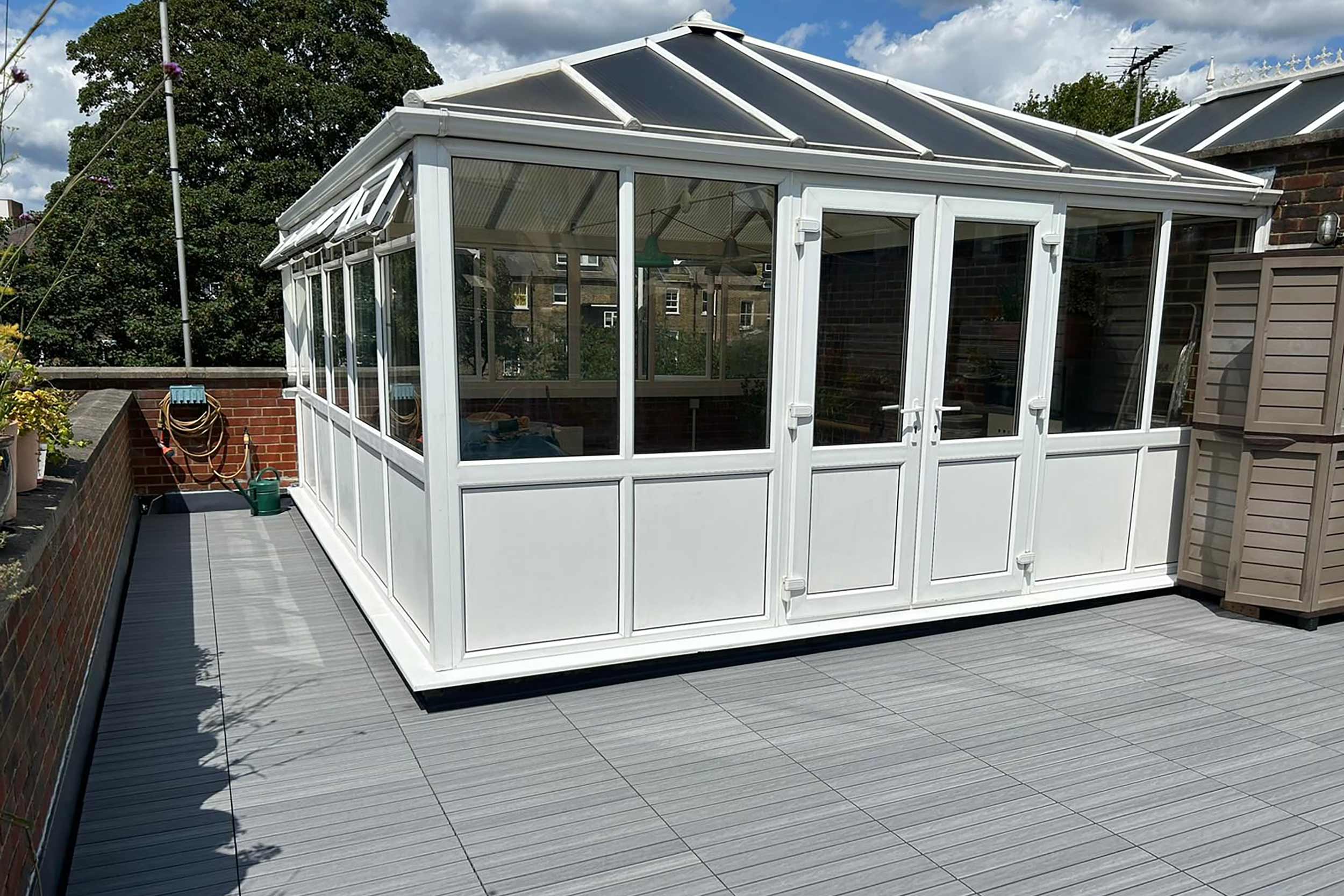 Roofer Kingston Surrey a roofing company and flat roof specialist services contractor, a trusted best reliable roof terrace garden builder.