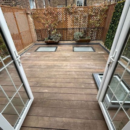 Robust flat roof decking preparation in Weybridge, Surrey, demonstrating our rigorous structural assessment process before waterproofing application.