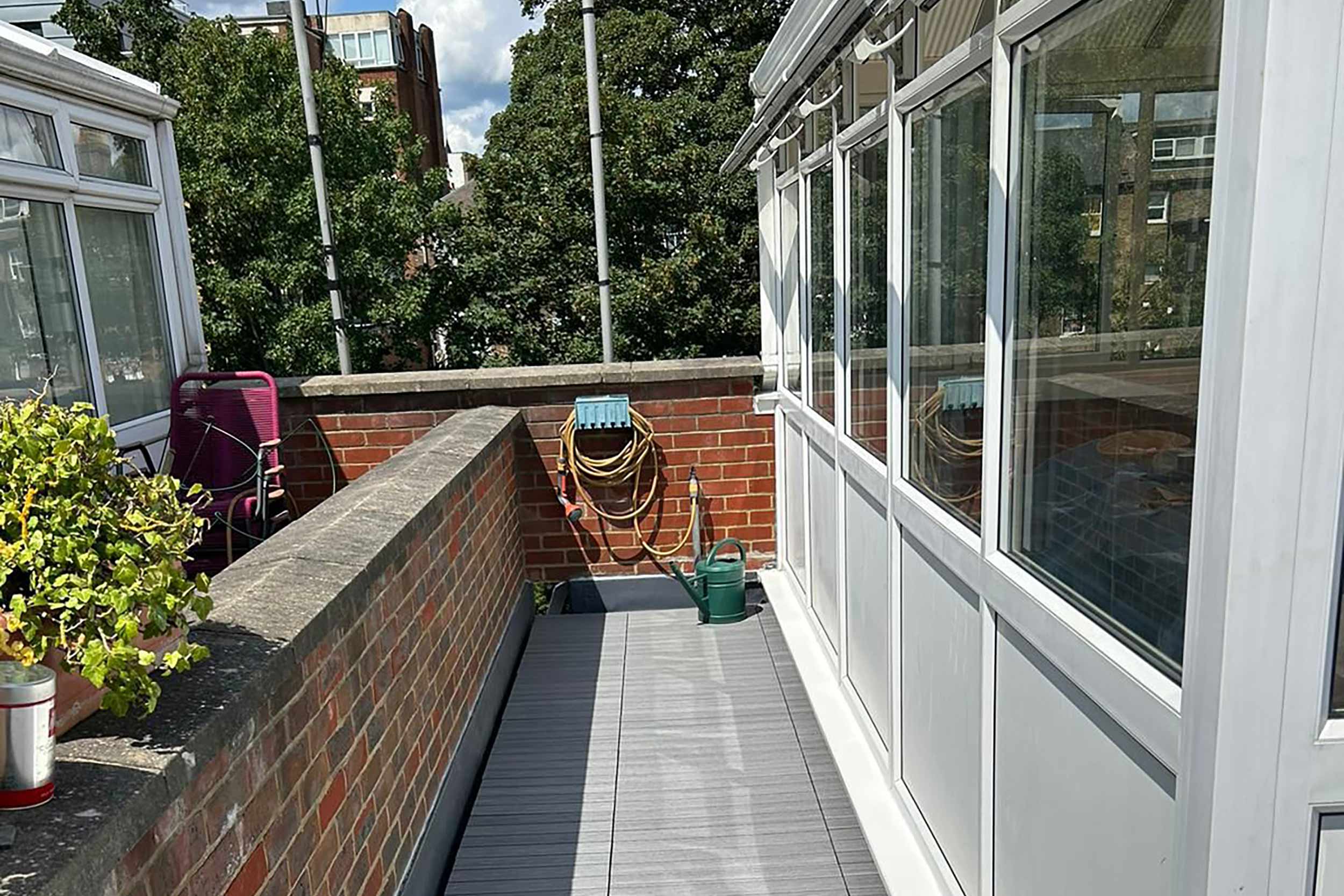 Roofer Kingston Surrey a roofing company and flat roof specialist services contractor, a trusted best reliable roof terrace garden builder.
