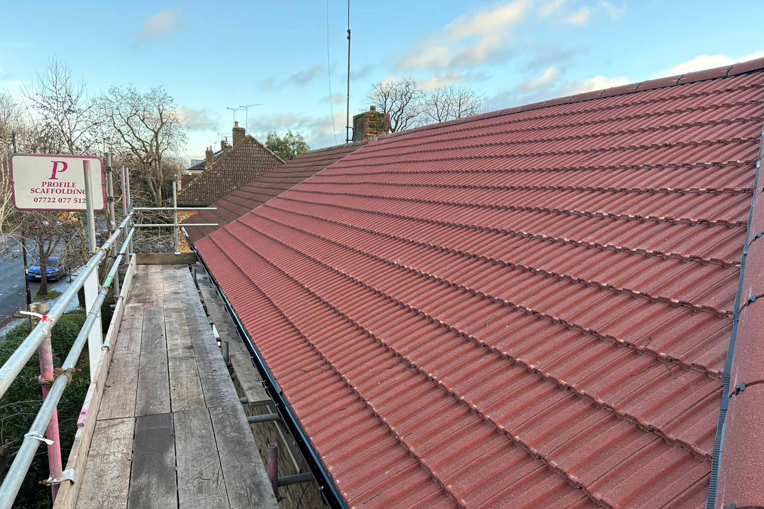 Roofer Chelsea London replacement Interlocking pitched roof tiles, roofing services roof company this upgrade not only improved the building.