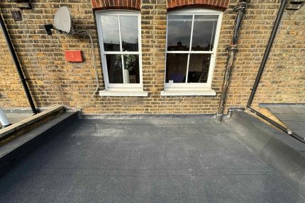 Seamless flat roof finish designed to prevent leaks and ponding water.