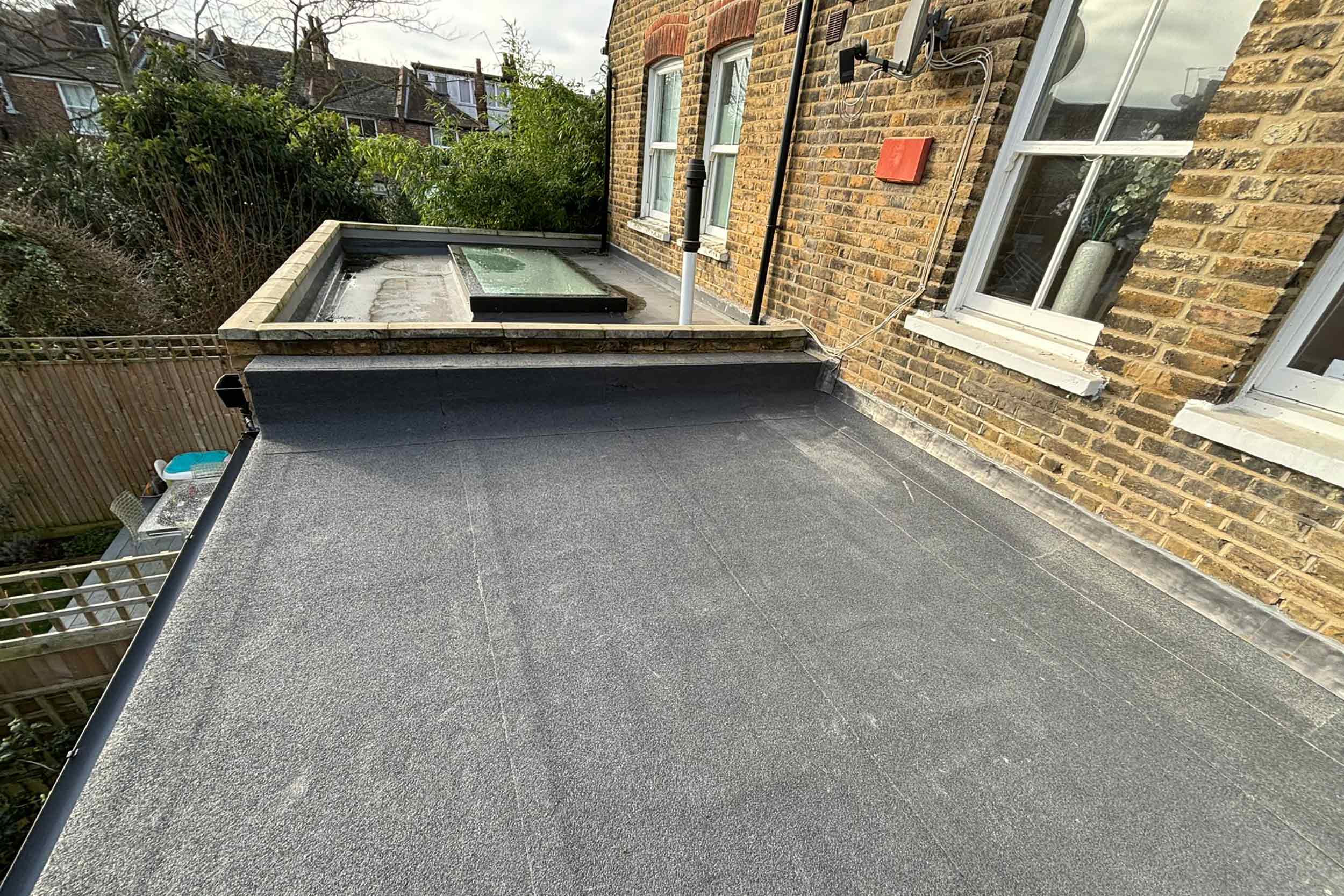 Flat Roofer Richmond Surrey contractor Specialist Roofing Company Sika Sarnafil residents and businesses in need of flat roofing solutions.