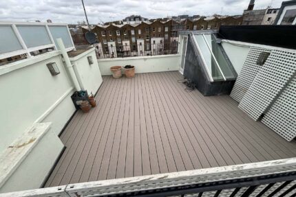 Installing a structural treated plywood deck and 120mm PIR insulation for thermal efficiency.