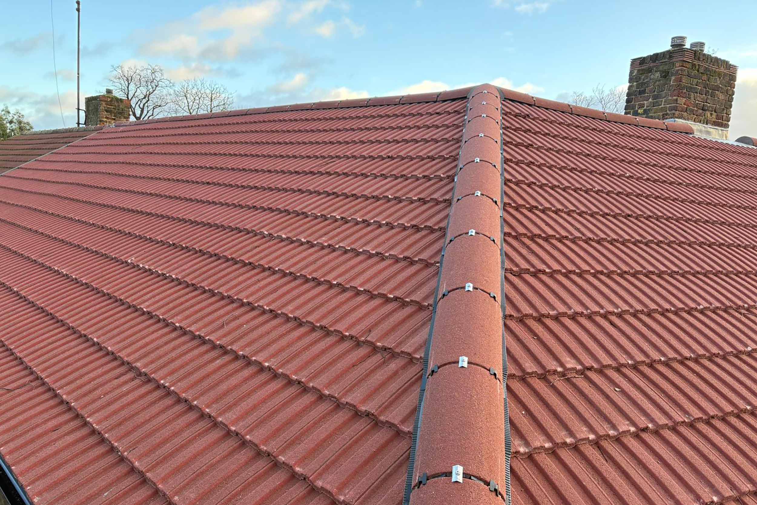Roofer Chelsea London replacement Interlocking pitched roof tiles, roofing services roof company this upgrade not only improved the building.