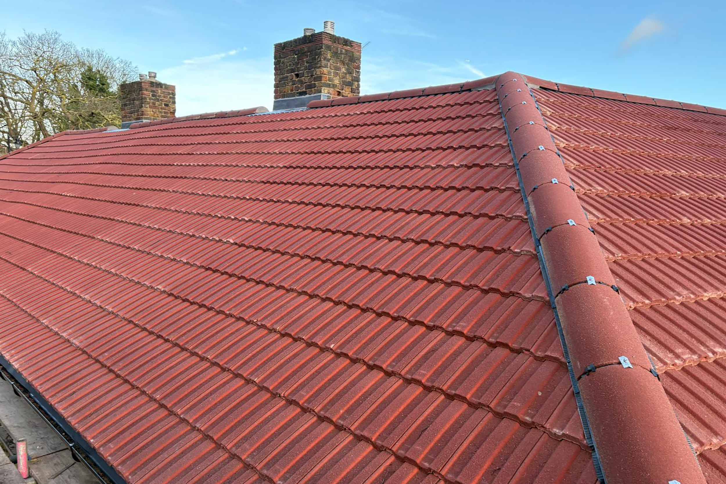 Roofer Chelsea London replacement Interlocking pitched roof tiles, roofing services roof company this upgrade not only improved the building.