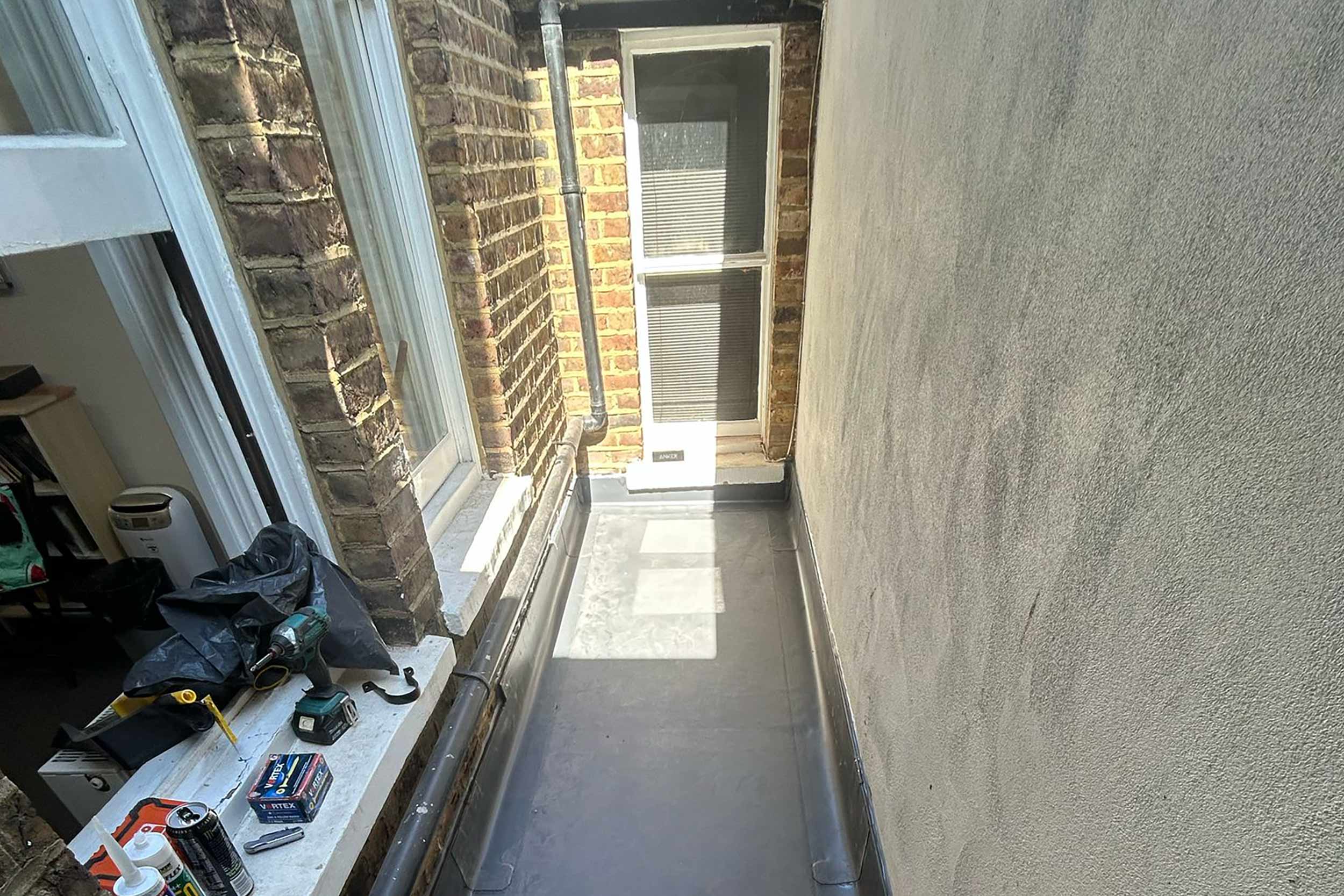 Flat roofer company Ealing London, roofing service by expert specialist roof company located in a residential area of Ealing.