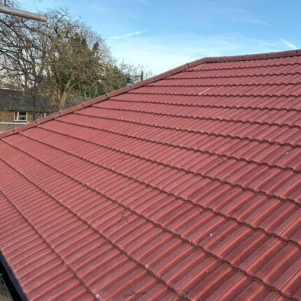 Heritage pitched roofing upgrade in Highgate North London, illustrating premium terracotta clay tiles and expert thermal insulation integration.