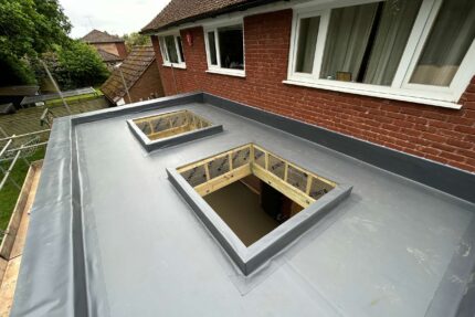 Applying durable, weather-resistant Sika Sarnafil single-ply membrane to a Kew residential extension.